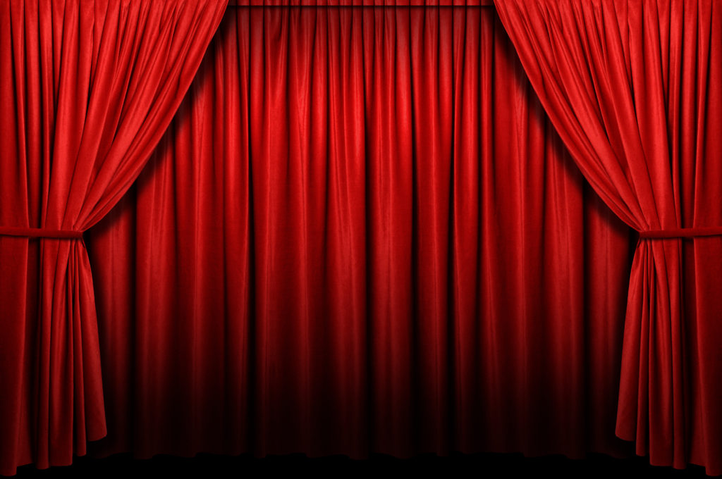 Red stage curtain with arch entrance | The Off Broadway Theatre